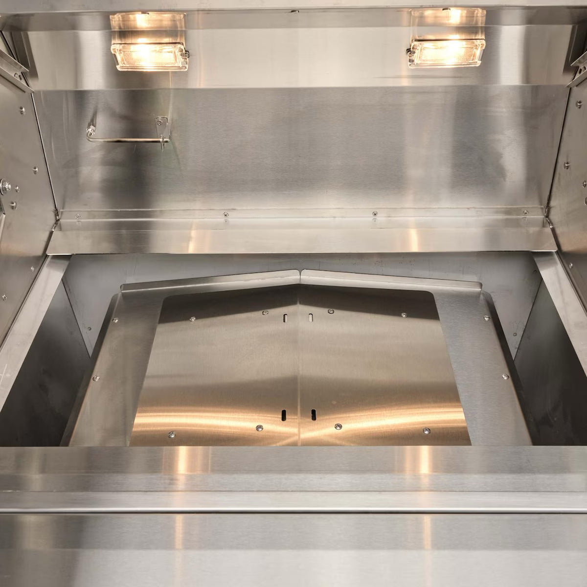 Coyote Pellet Grill cooking chamber in smoking mode