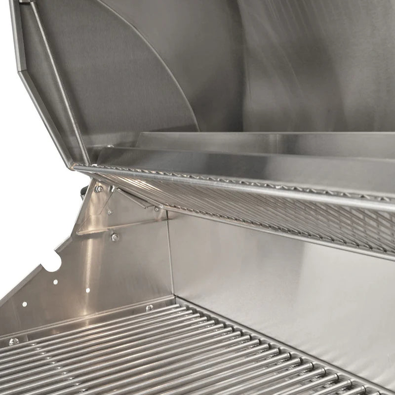 Coyote CL Series Built In Grill with a spring assisted hood.