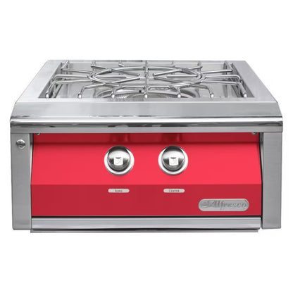 Stainless steel gas cooktop with red front panel on a white background