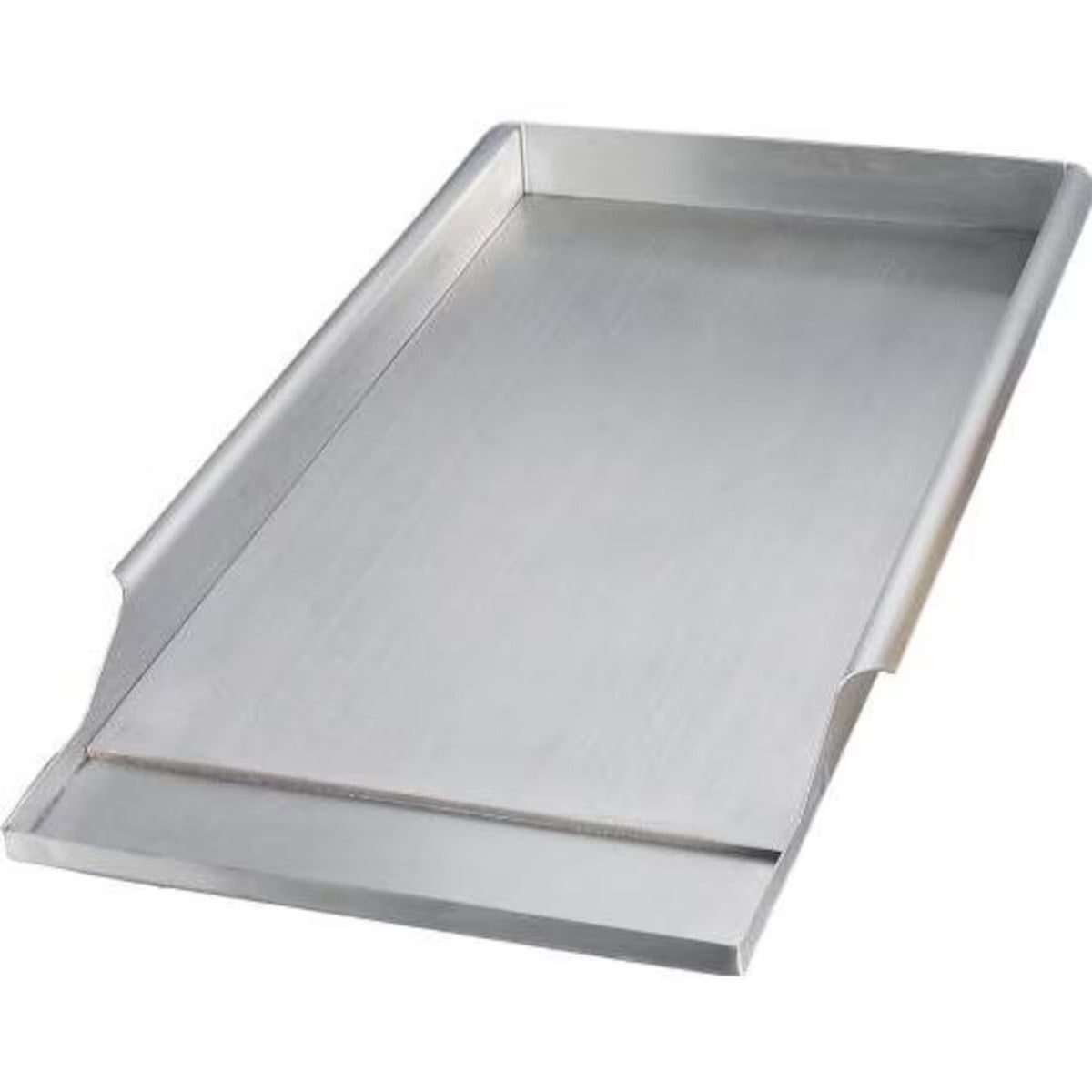 Stainless steel griddle on a white background