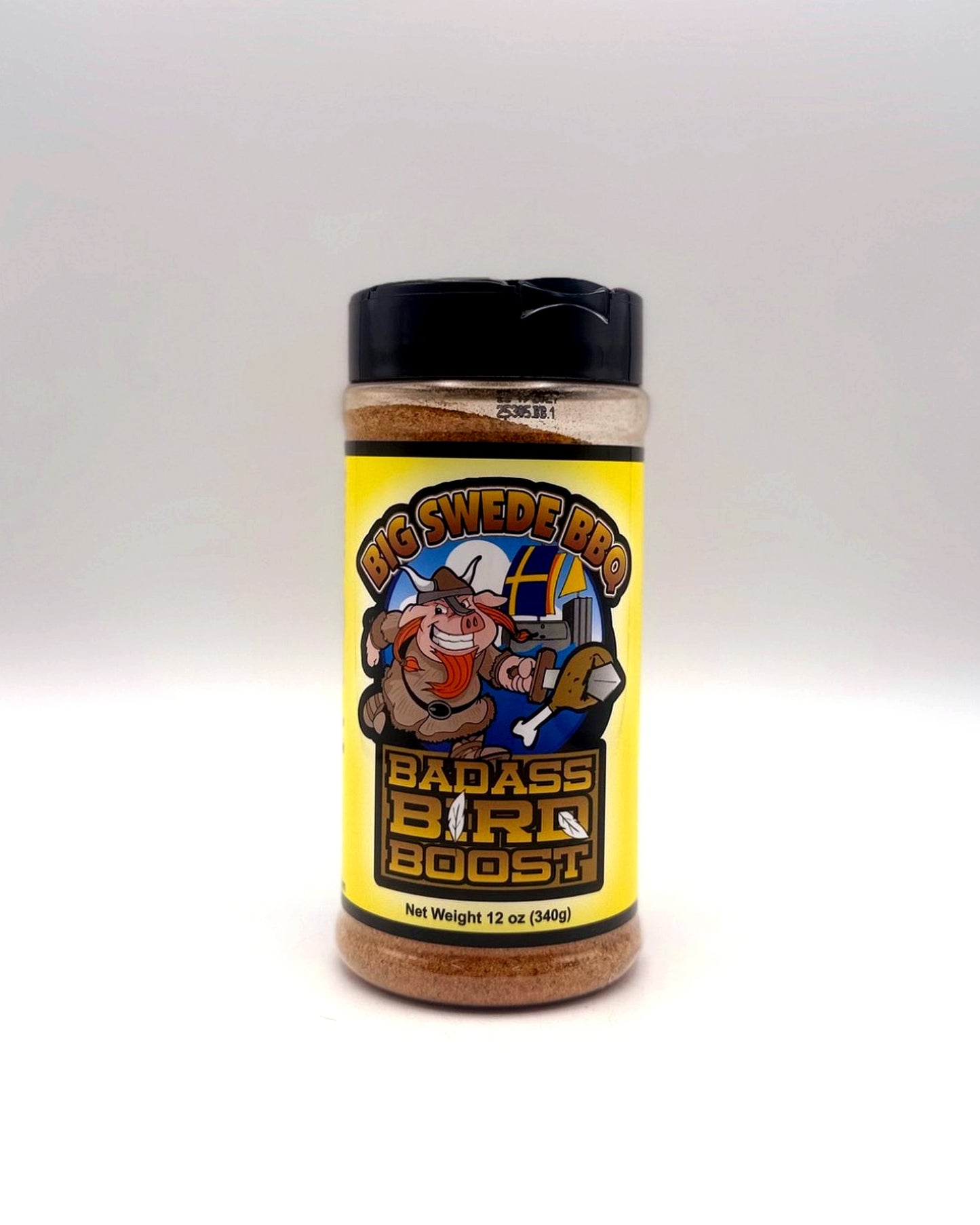 Jar of 'Big Swede BBQ Badass Bird Boost' seasoning with a cartoon character on a white background