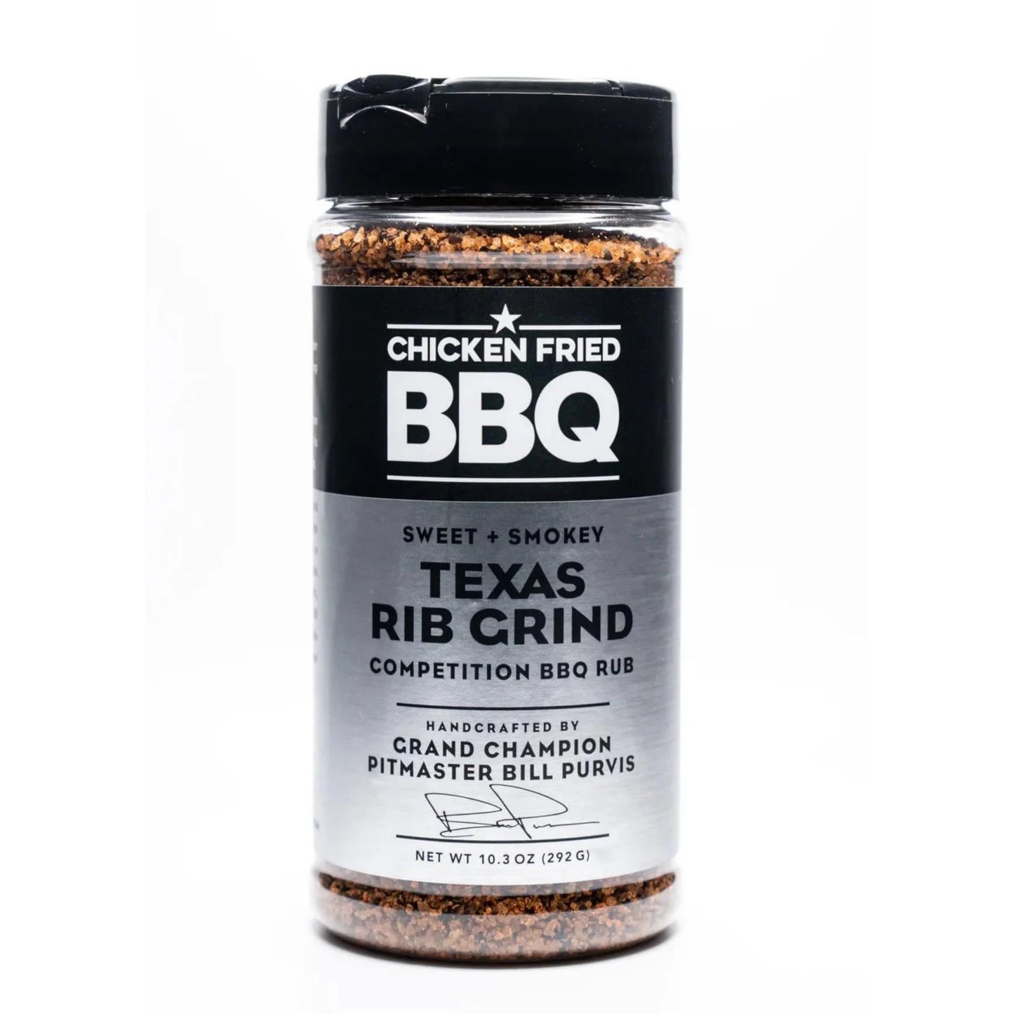 Jar of Texas Rib Grind BBQ rub with black lid on a white background
