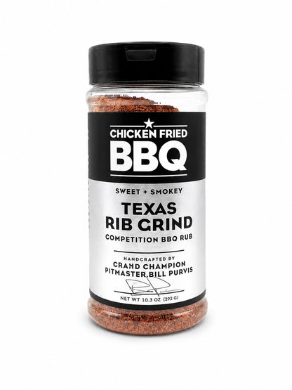 Jar of Texas Rib Grind BBQ rub with a black lid on a white background