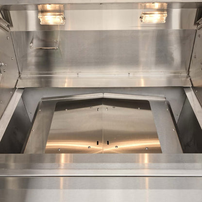 Coyote Pellet Grill cooking chamber in smoking mode