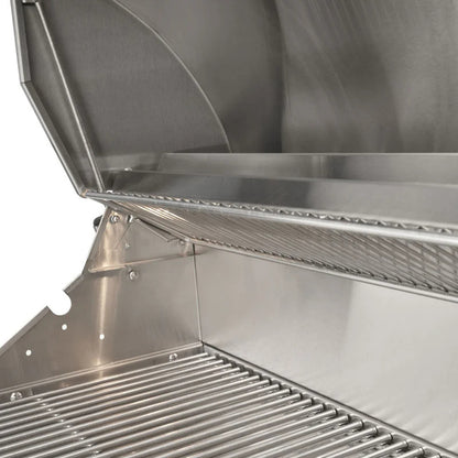 Coyote CL Series Built In Grill with a spring assisted hood.