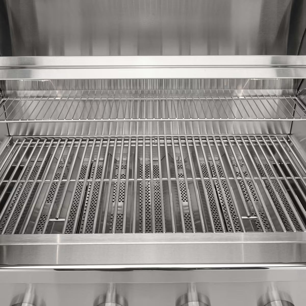 Stainless steel grill with multiple levels and perforated design