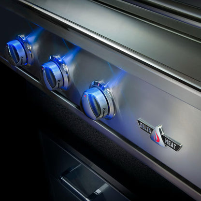 Delta Heat 26" built in unit with illuminated knobs on a stainless steel grill