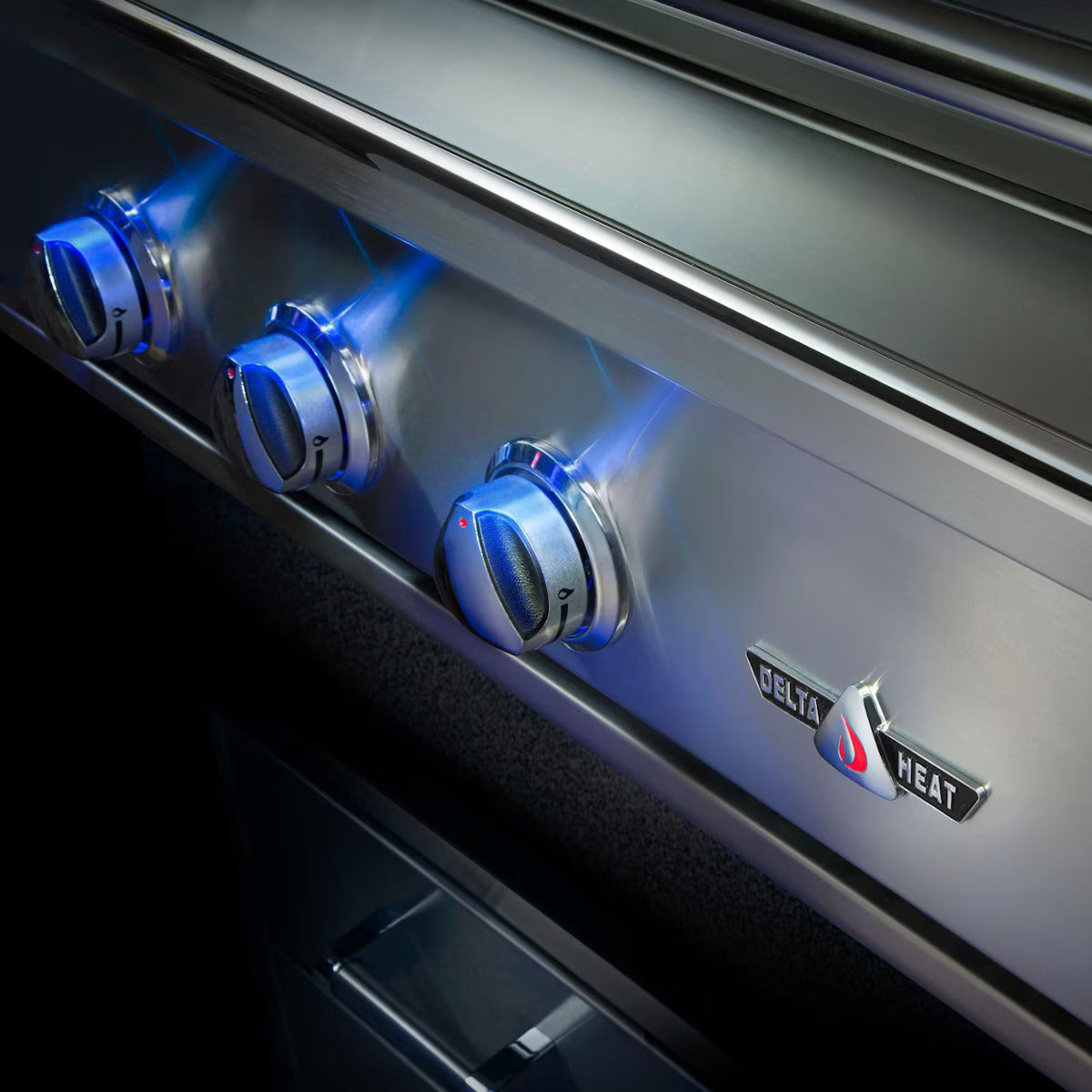 Close-up of grill control knobs with Delta Heat logo