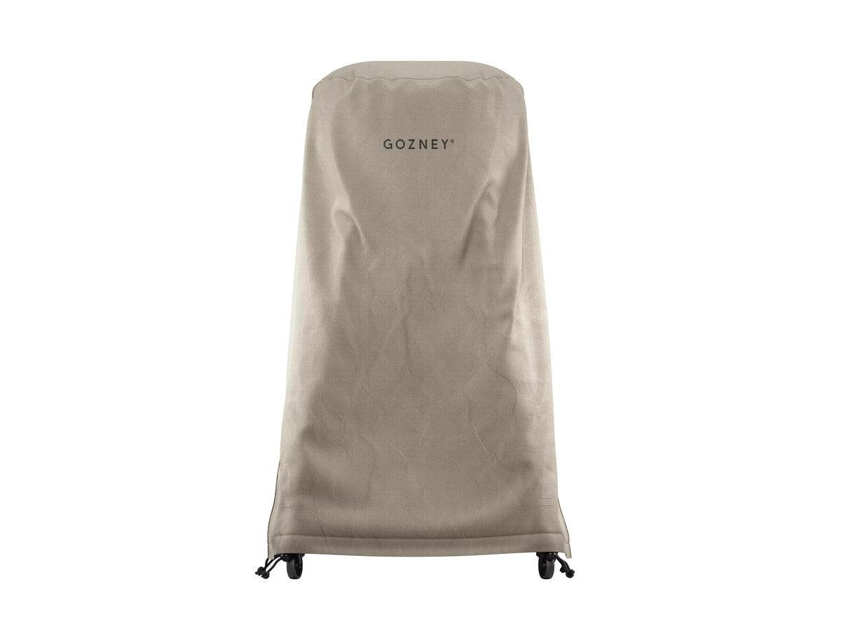 A beige, fabric cover for the Gozney Arc outdoor grill, featuring the brand's logo on the front.