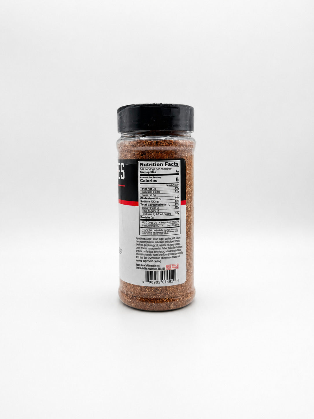 Heath Riles BBQ & Grilling Peach Rub bottle showing the ingredients label on a white background