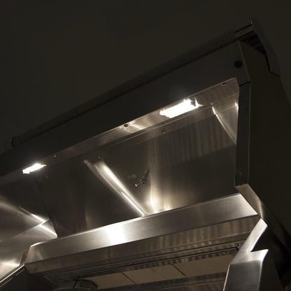 Hestan 36" Built In Gas Grill with lights on at nighttime 