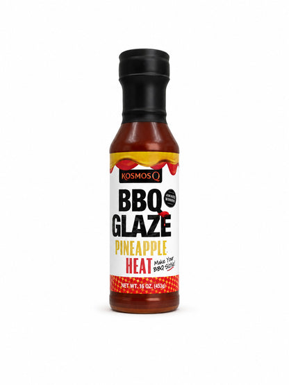 Bottle of Kosmos Q Pineapple Heat BBQ Glaze on a white background