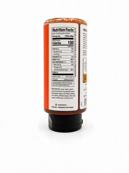 Kosmos Q Peach Jalapeño BBQ Glaze bottle with nutrition facts label on a white background