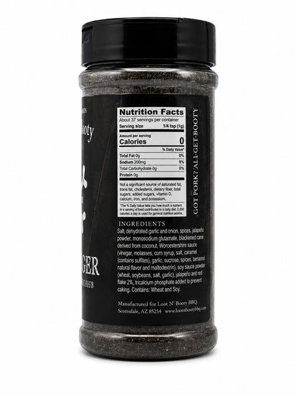 Black seasoning jar with nutrition facts label on a white background