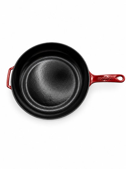 Made In Enameled Cast Iron Skillet with Made In Red Handles on a white background