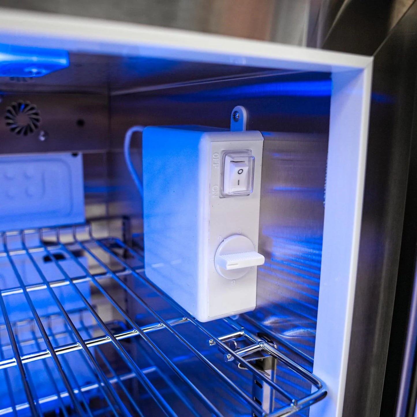 Control panel inside a Mont Alpi Refrigerator with blue light