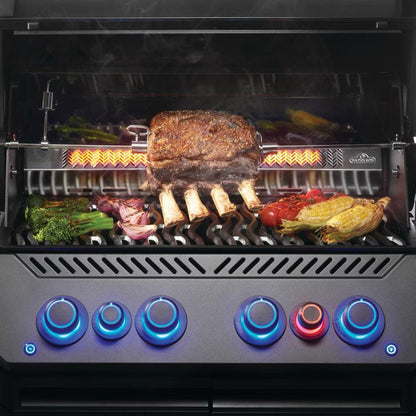 Napoleon Prestige Phantom 500 Connected 4-Burner Grill w/ Rotisserie, WiFi & Bluetooth with food on rotisserie and grill