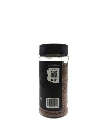 Over the Fire BBQ Supply Brisket and Steak rub bottle on a white background
