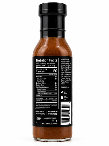 Saucy Luke Craft BBQ Dirty Blonde Mustard Sauce bottle with a nutrition label on a white background
