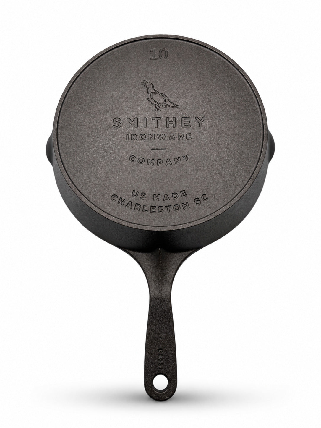 Black 10" cast iron skillet with 'Smithey Ironware Company' branding on a white background