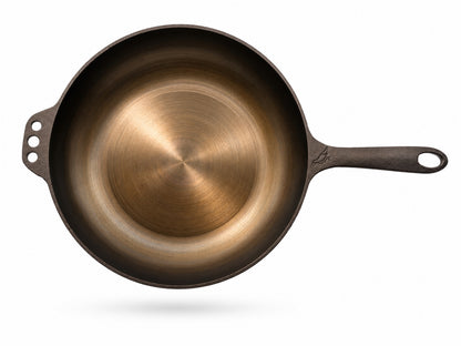 Smithey Ironware 11" Round Bottom Skillet on a white background