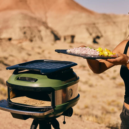Gozney Tread Roof Rack Server on a pizza oven in the desert