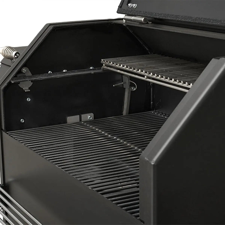 Close up of Yoder Smokers ys640s Pellet Smoker with the lid open on a white background