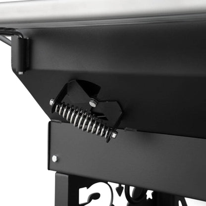 Close up of Yoder Smokers Charcoal Flat Top Grill adjustable air flow vents on a white background