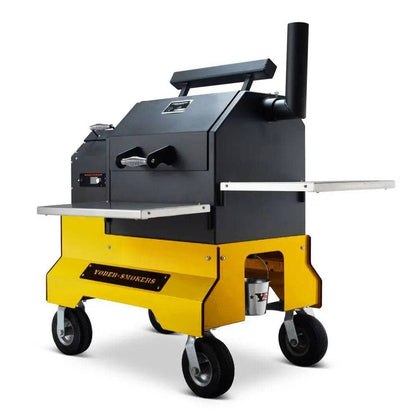 Yellow and black smoker grill on a white background